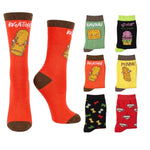 A set of novelty crew socks displayed on a white background, featuring a large red sock with a hot dog illustration and text on the left, and six smaller color variants on the right including red, green, black, and yellow options with food-themed prints.