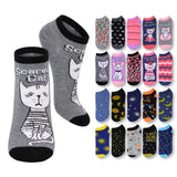 Assorted pairs of socks with cat-themed designs on a white background