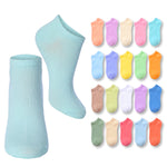 Set of colorful socks in various shades with a light blue container on a white background.