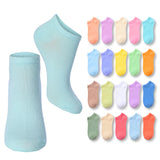 Set of colorful socks in various shades with a light blue container on a white background.