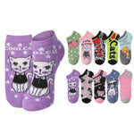 A set of low-cut ankle socks featuring a cat theme, shown in two groups: a larger purple pair with white stars and a white cat wearing a black bow, and a smaller multi-pack of assorted socks in green, pink, black, blue, and gray, each with a different cat graphic.