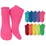 A pair of bright pink ankle socks displayed prominently on the left, with a row of additional ankle socks in teal, blue, purple, pink, red, orange, yellow, green, and light green shown on the right against a plain white background.
