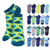 A pair of neon yellow-green and dark blue ankle socks with a repeating fish pattern, displayed alongside a grid of twelve other colorful sock patterns including space, ocean, beach, and animal prints.