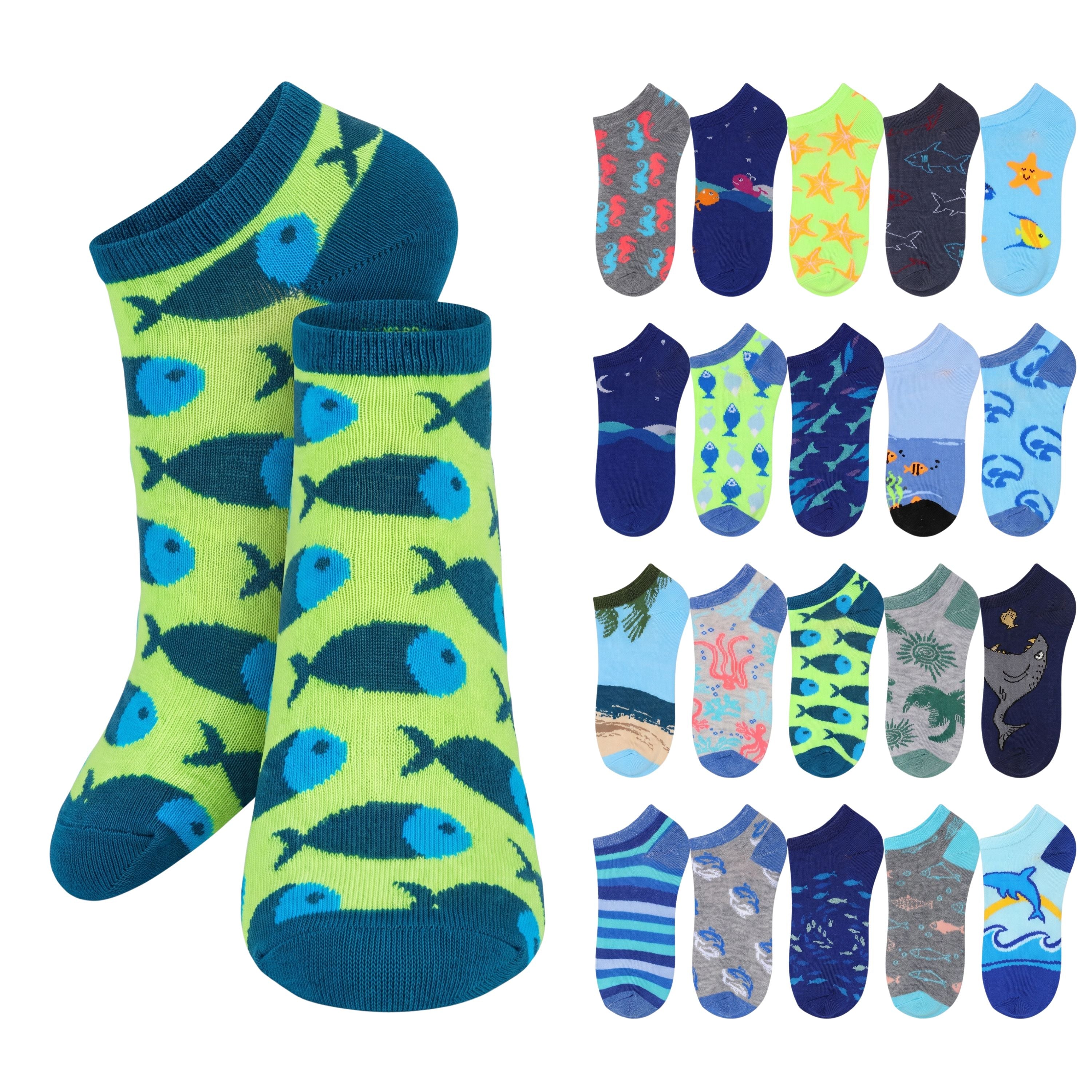 A pair of neon yellow-green and dark blue ankle socks with a repeating fish pattern, displayed alongside a grid of twelve other colorful sock patterns including space, ocean, beach, and animal prints.