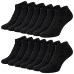 Multiple pairs of black ankle socks on a white background