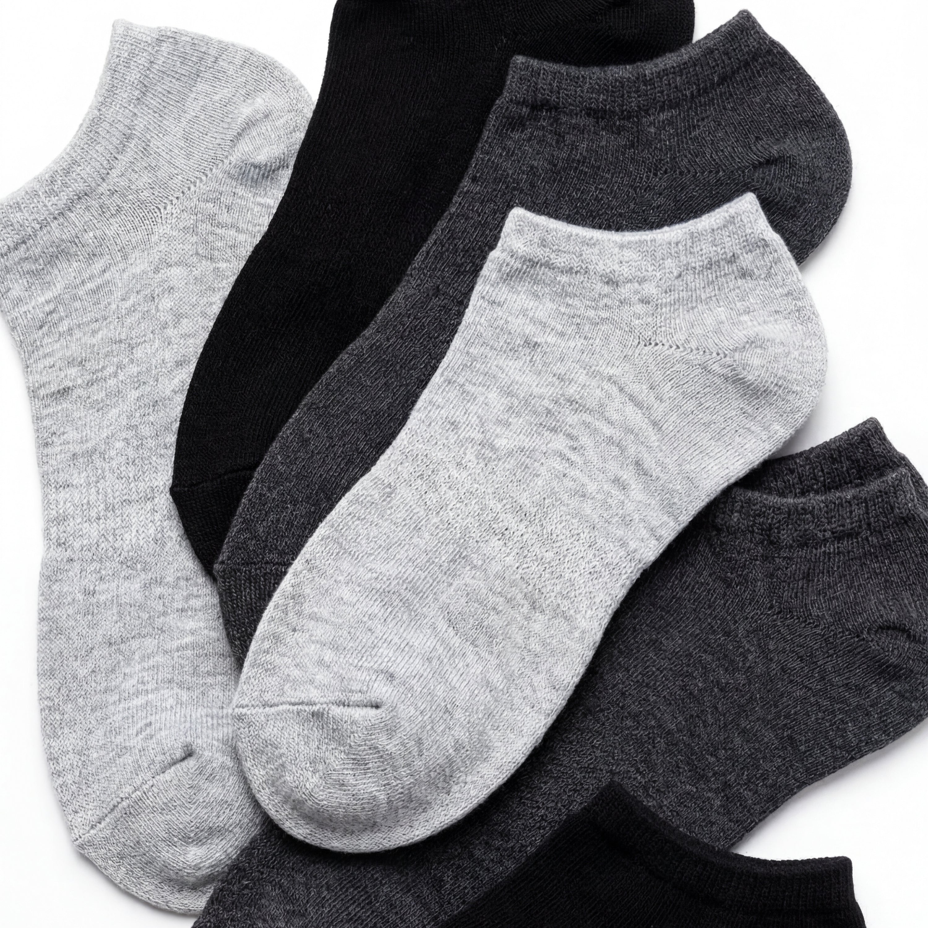 Set of gray and black ankle socks on a white background