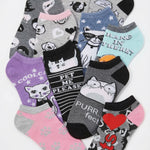 Collection of cat-themed socks with various designs on a white background