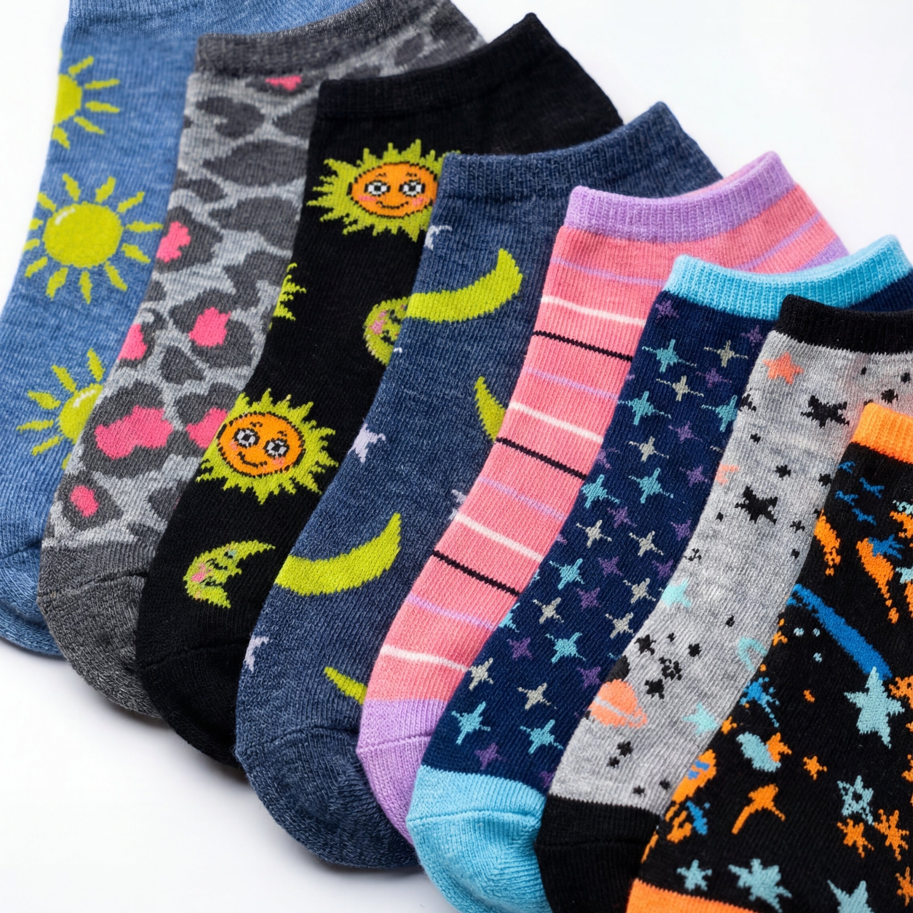 Assorted colorful socks with various patterns on a white background
