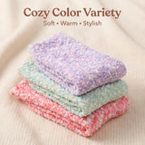 Stack of colorful knitted towels on a beige fabric background with text 'Cozy Color Variety'.