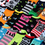 Collection of colorful socks with various animal designs arranged in a grid.