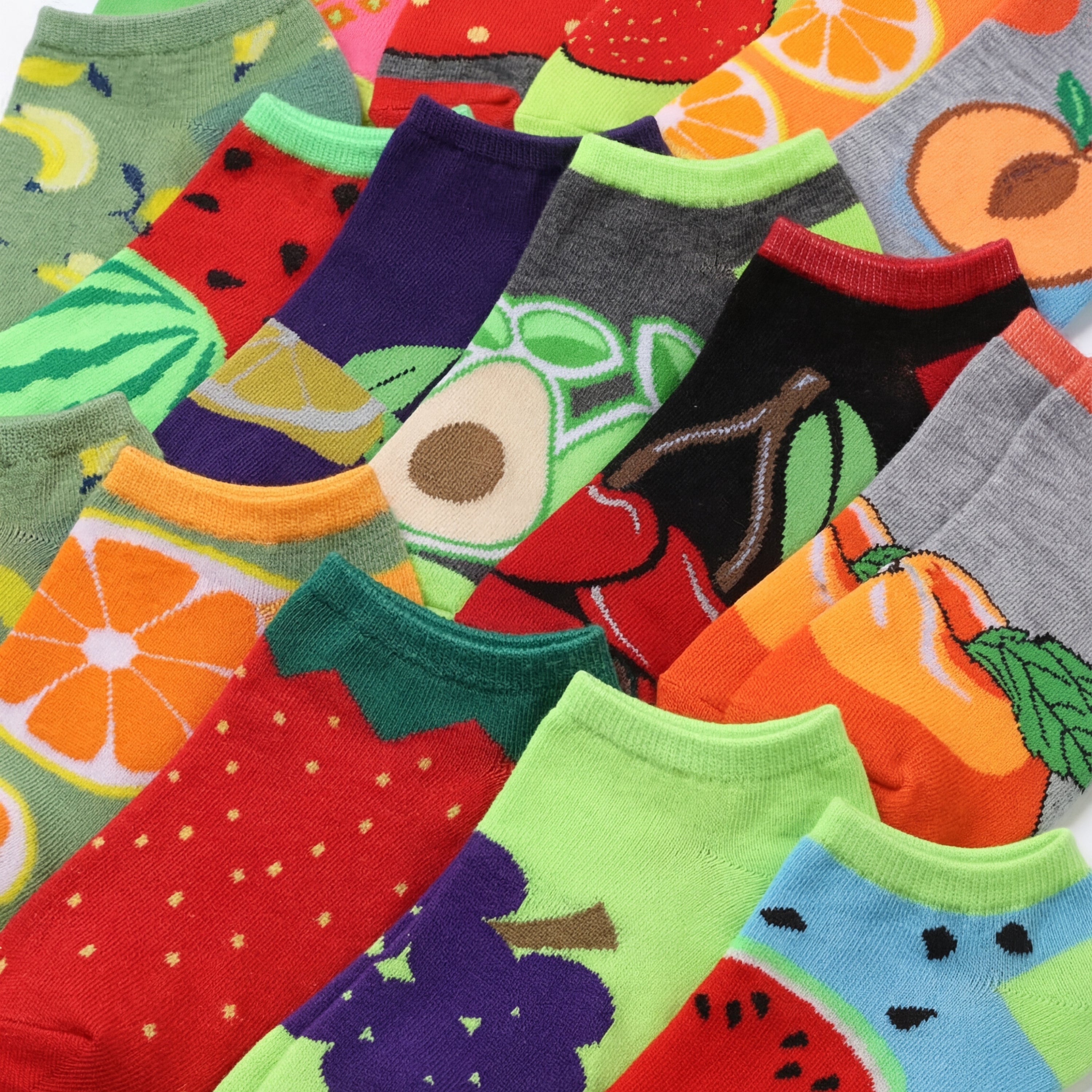 Collection of colorful socks with fruit designs.