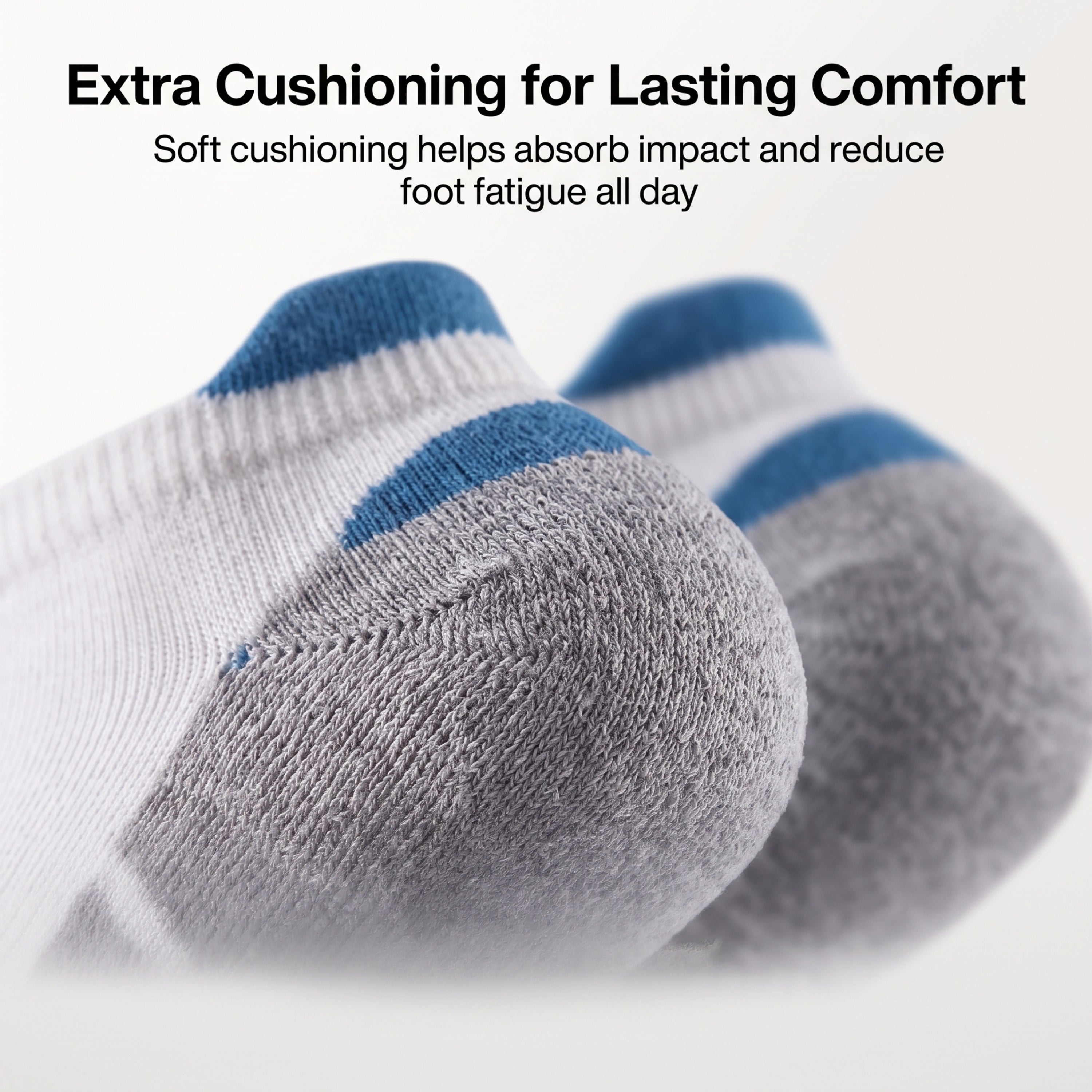 Close-up of a pair of athletic socks with gray toes, white heels, and blue tops, with marketing text about cushioning and comfort on a light background.