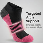 Black and pink sock with targeted arch support on a light gray background