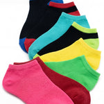 Set of colorful ankle socks on a white background