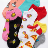 Collection of colorful socks with food-themed designs on a white background