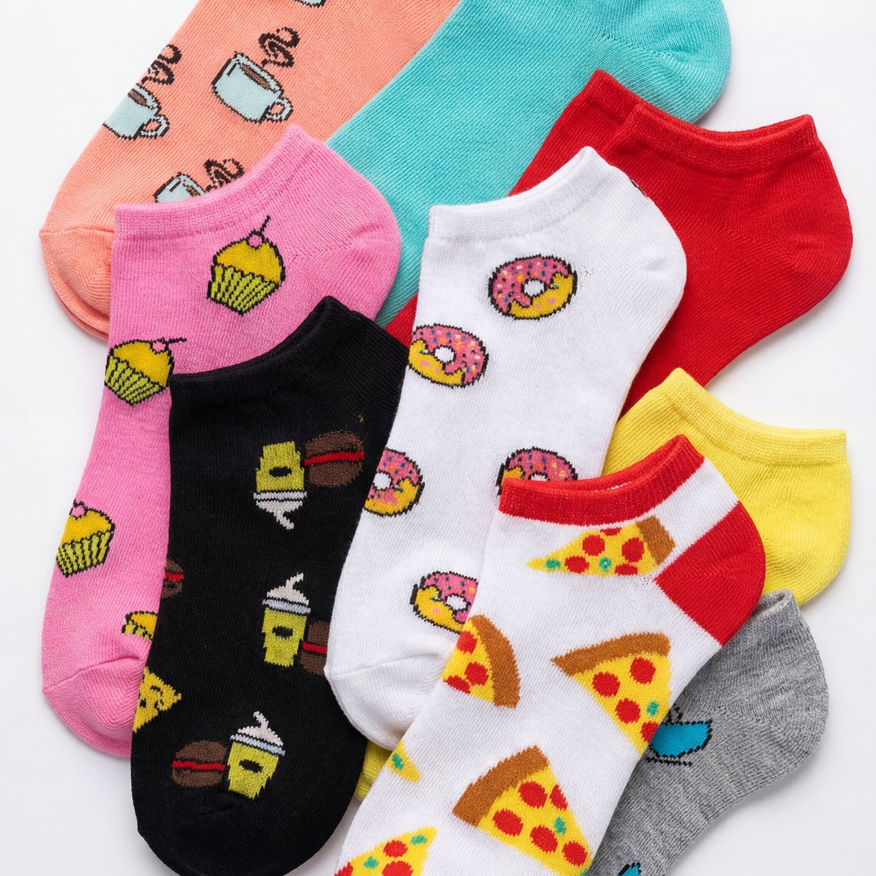 Collection of colorful socks with food-themed designs on a white background