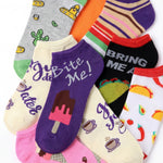 Collection of colorful socks with various designs and text on a white background
