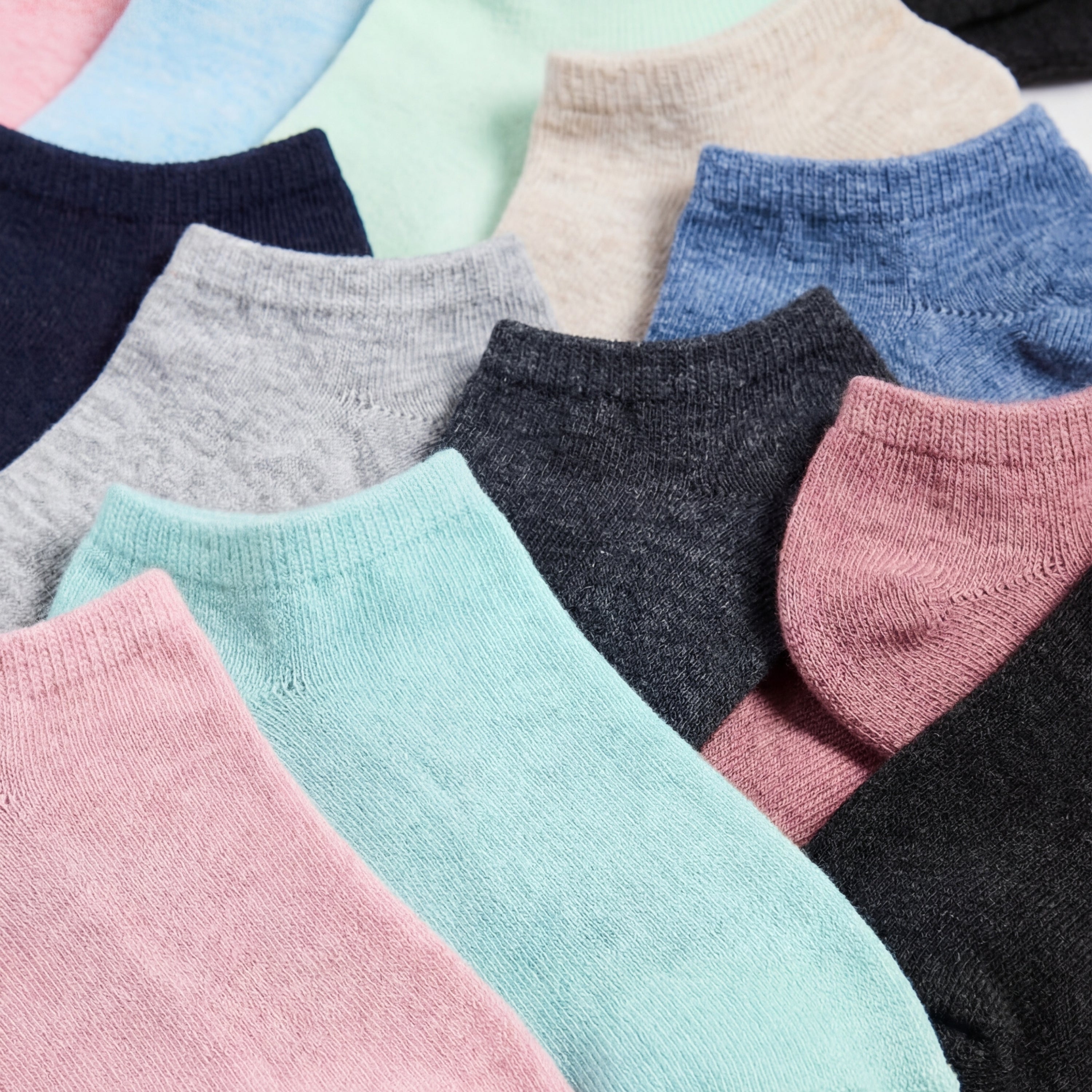 Assorted colorful socks arranged in a row