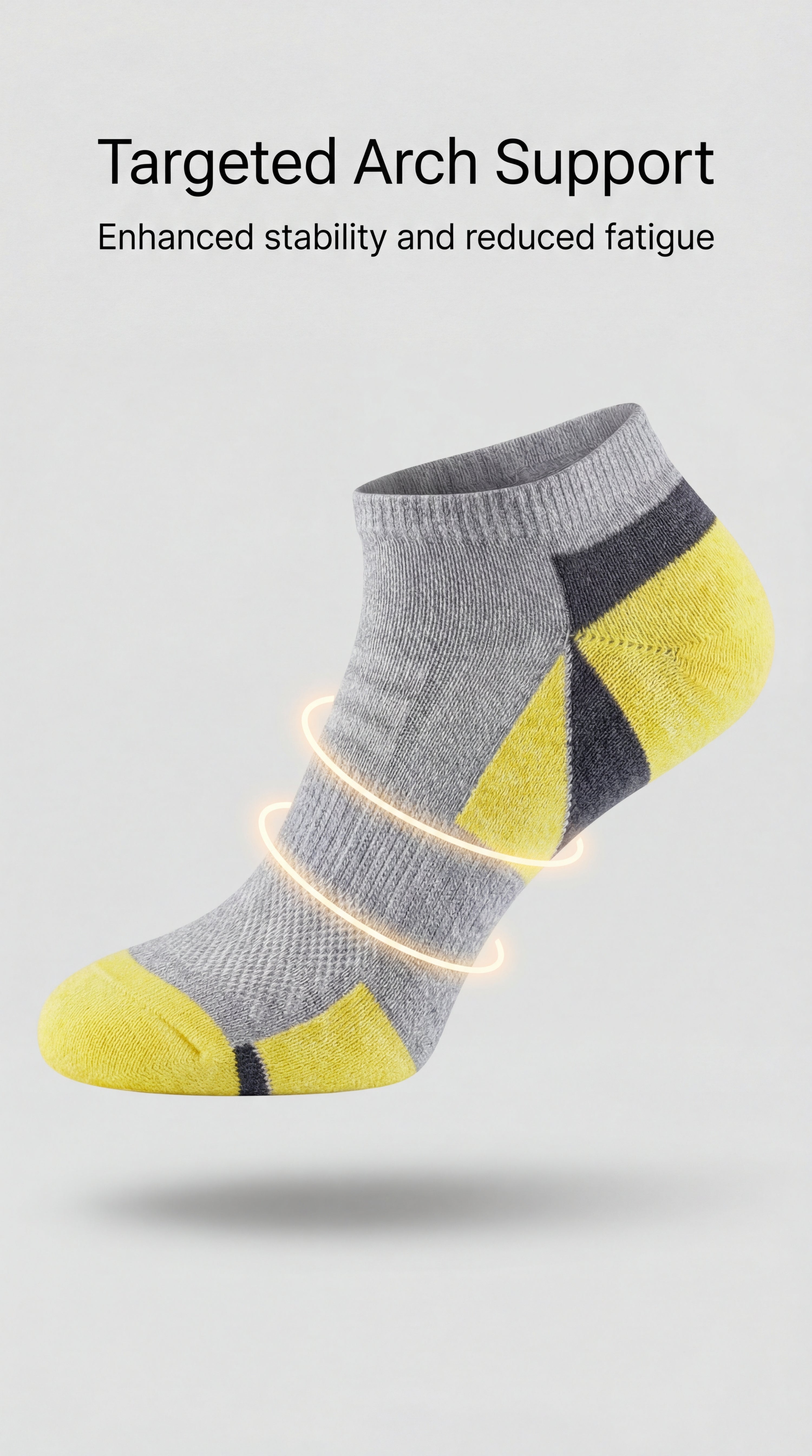 Gray and yellow sock with targeted arch support on a light gray background