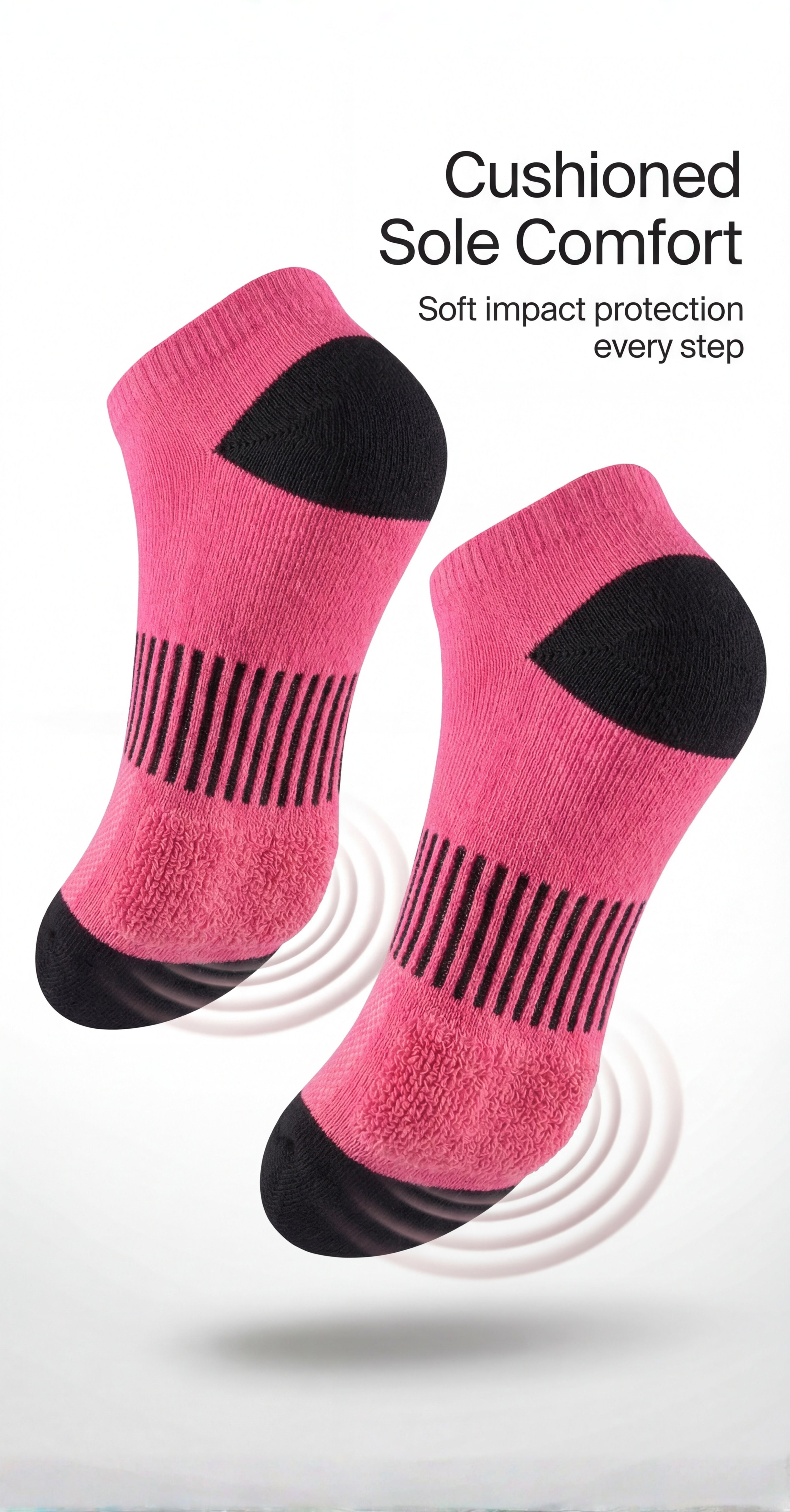 Pink socks with black accents on a white background, emphasizing cushioned sole comfort.