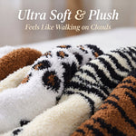 Plush tiger-patterned blanket with text 'Ultra Soft & Plush Feels Like Walking on Clouds' on a blurred background.