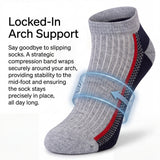Gray sock with compression band on a white background, highlighting arch support feature.