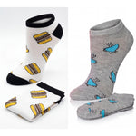 Two pairs of socks with unique patterns on a white background