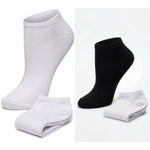 Set of white and black ankle socks on a white background
