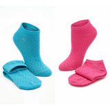 Two pairs of socks, one blue and one pink, on a white background.