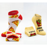 Two pairs of socks with pizza and French fry designs on a white background