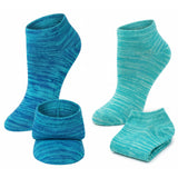 Set of blue and green striped socks on a white background