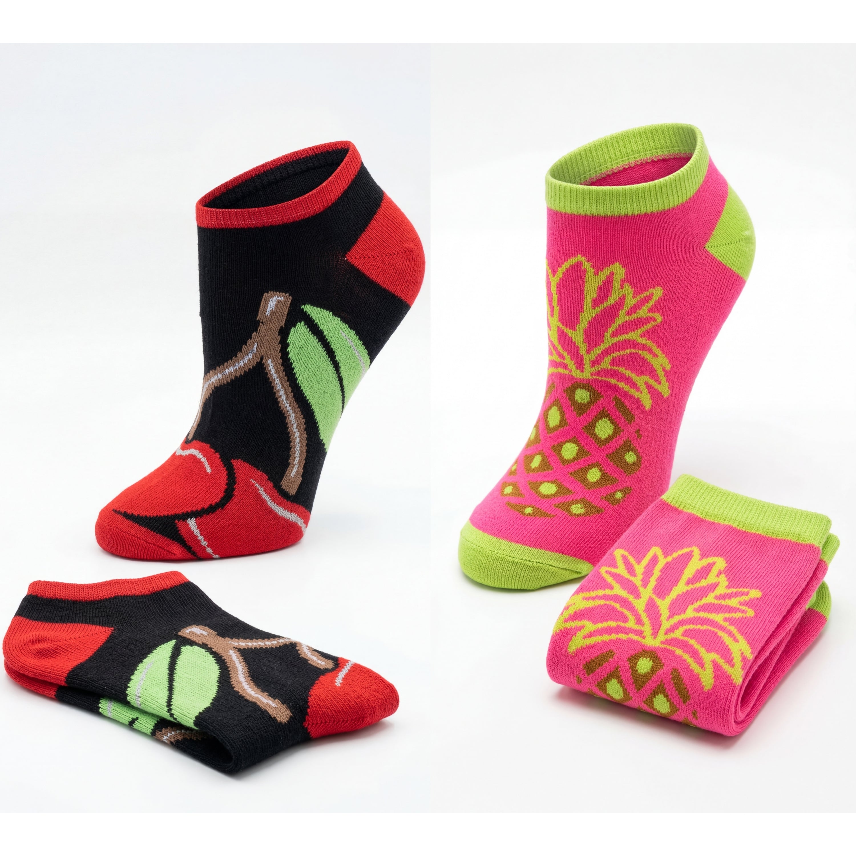 Two pairs of socks with pineapple designs on a white background