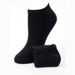 Pair of black ankle socks on a white background