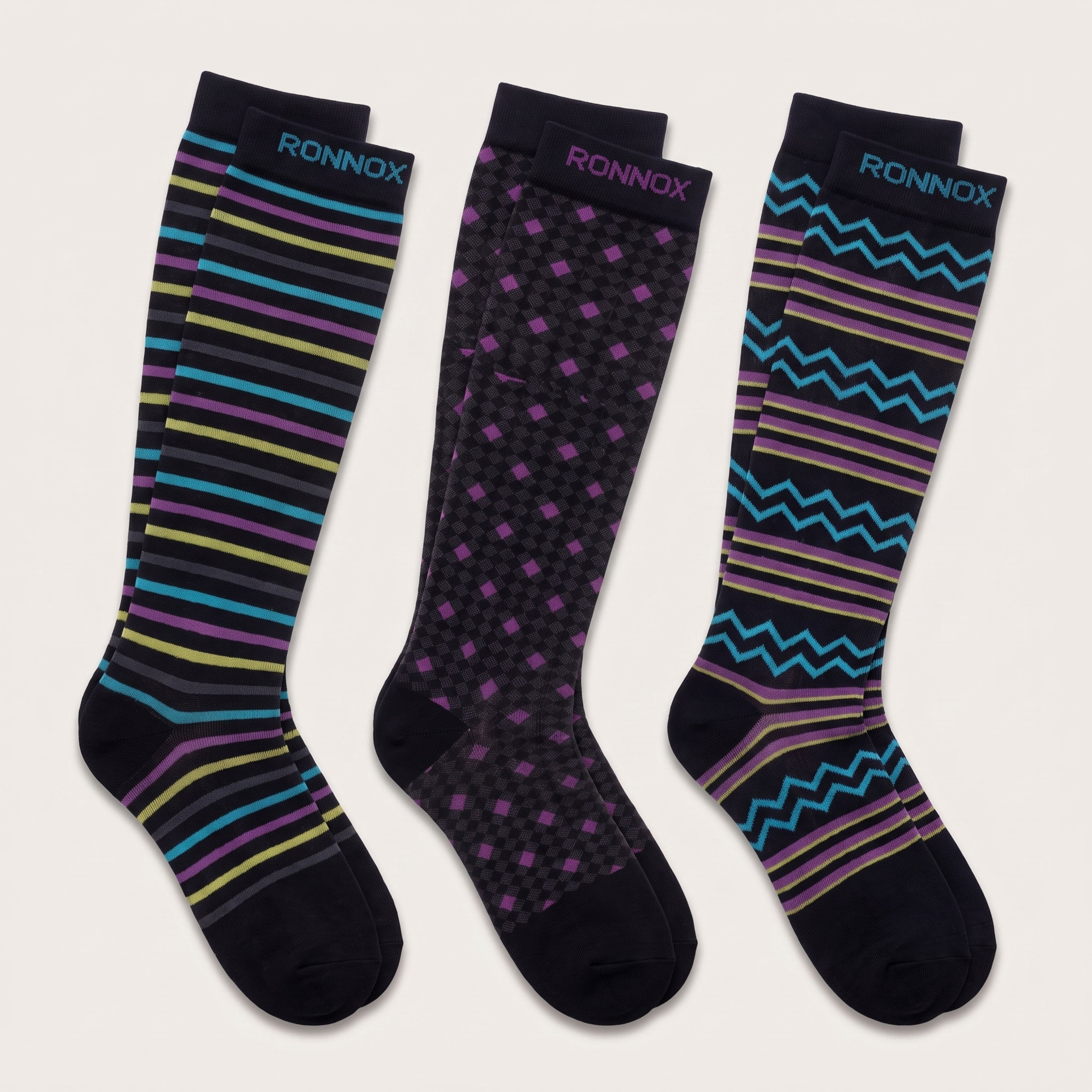 Three pairs of knee-high socks by Ronnox on a light beige background. The left pair has black, purple, yellow, and teal horizontal stripes.