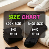 Black socks with a size chart showing sock and shoe size correspondences on a wooden floor.