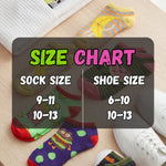 Colorful socks with a size chart indicating sock and shoe sizes on a wooden surface.