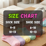 Colorful socks displayed with a size chart overlay on a wooden surface.