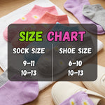 Colorful socks with a size chart indicating sock to shoe size correspondence on a wooden surface.
