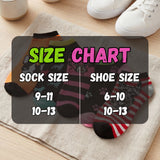 Size chart for socks and shoes with colorful socks on a wooden surface.