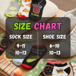 Colorful socks with various designs on a wooden surface, featuring a size chart for socks and shoes.
