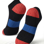 Black, red, and blue socks with cushioned sole comfort on a white background