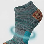 Textured sock with targeted arch support on a light gray background