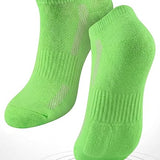 Green socks with cushioned sole on a white background