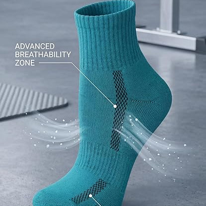Teal sock with labeled features on a gray surface
