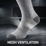 A gray knit sock shown on a foot against a dark studio background, with bright light rays and small particles emphasizing mesh ventilation. Large white text at the bottom reads “MESH VENTILATION.