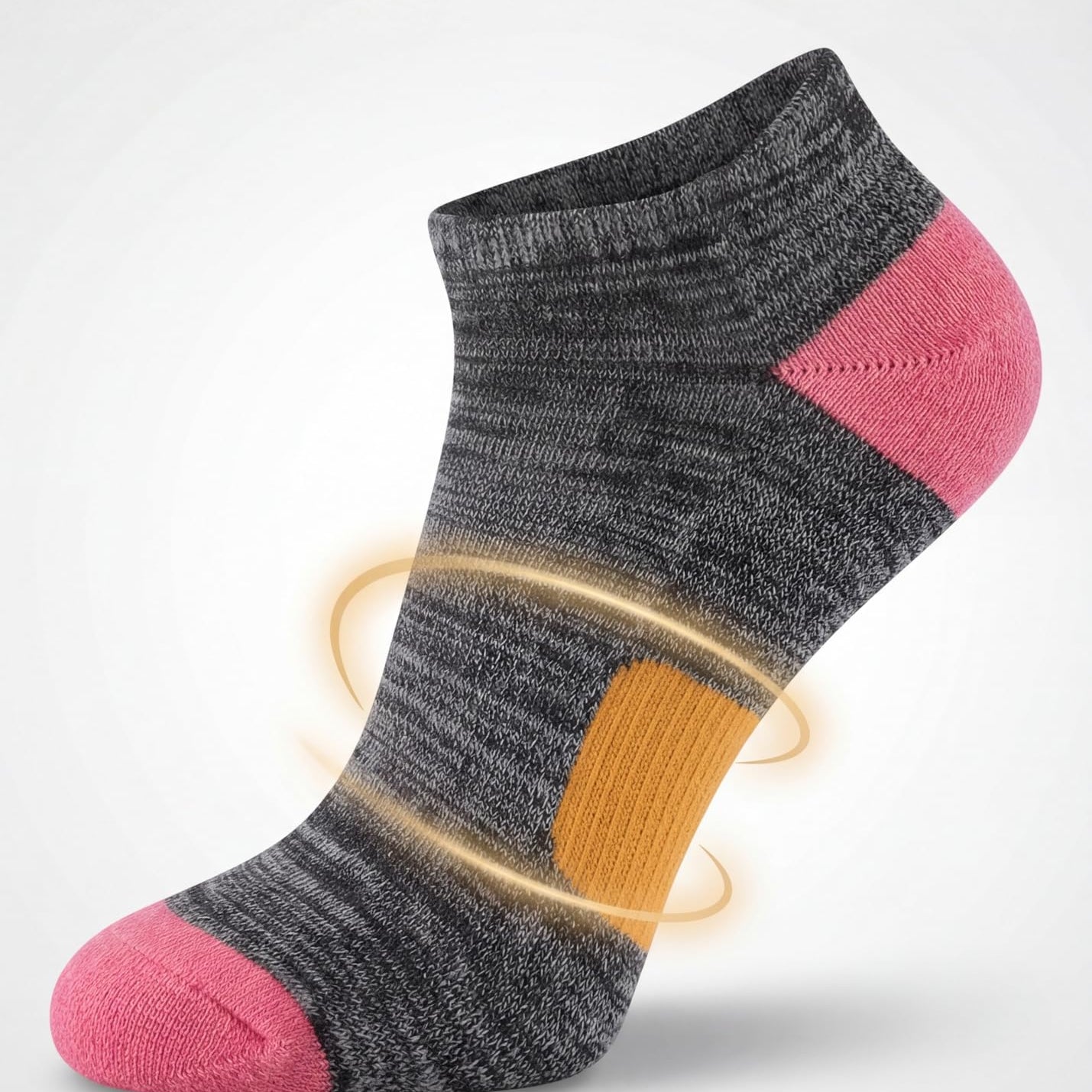 Gray and pink sock with arch support on a light gray background