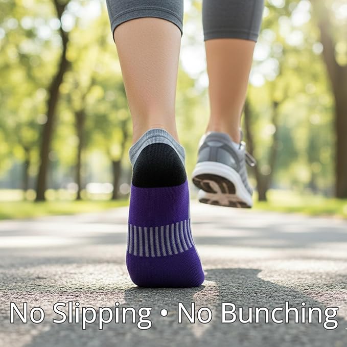 Person wearing purple socks with text 'No Slipping • No Bunching' on a blurred outdoor background
