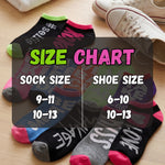 Size chart for socks and shoes with colorful socks and white sneakers on a wooden surface.