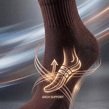 Brown sock with arch support design on a dark background