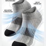 Gray ankle socks with black toes and soles, featuring text on features.